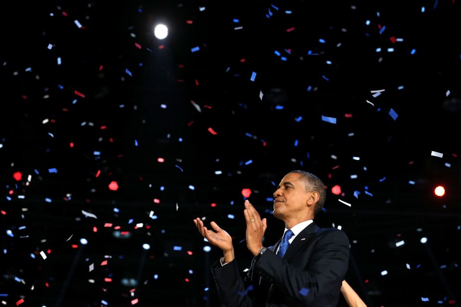 Red, white and blue confetti snowed down on President Barack Obama after a victory speech that promised brighter days ahead.