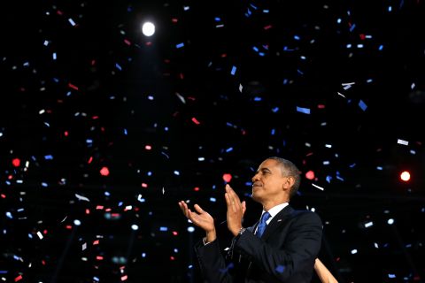 Red, white and blue confetti snowed down on President Barack Obama after a victory speech that promised brighter days ahead.