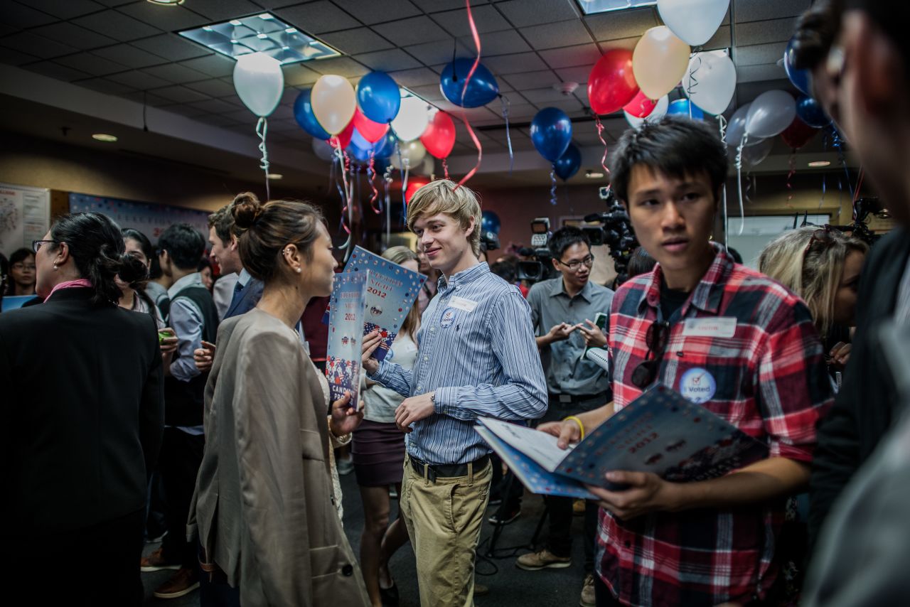 Students chat during an Election Day party at the U.S. consulate in Hong Kong on Wednesday.