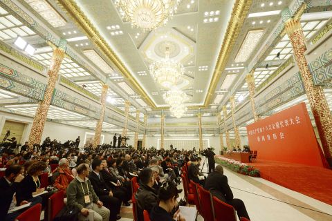 Members of the press gather inside the Great Hall of the People for a briefing on November 7.