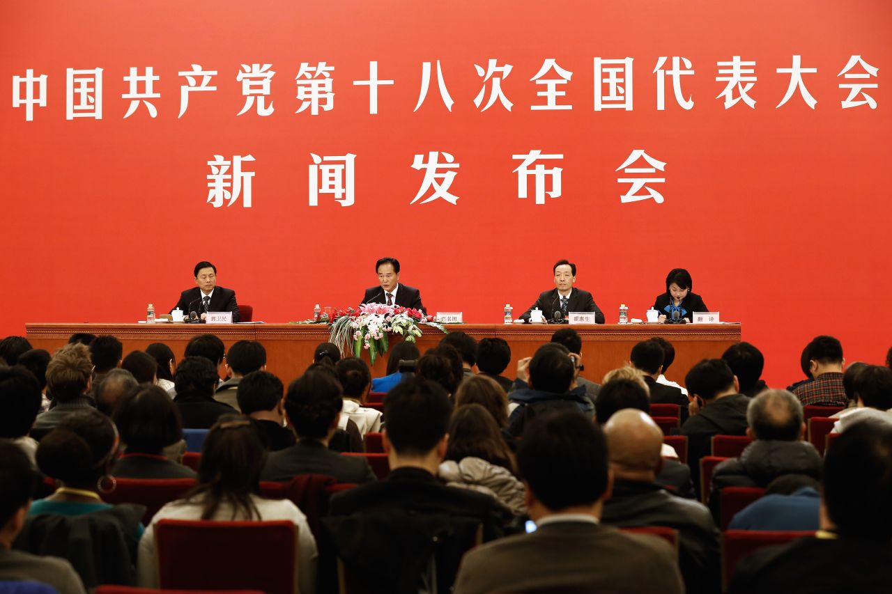 Congress spokesman Cai Mingzhao answers a question during a news conference at the Great Hall of the People.