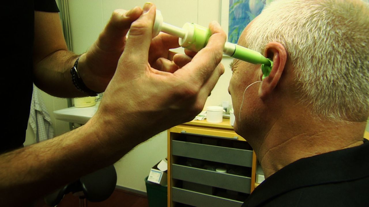 The first part of building the Widex hearing aid requires a mold of the ear canal to be made, as CNN's Nick Glass demostrates.   