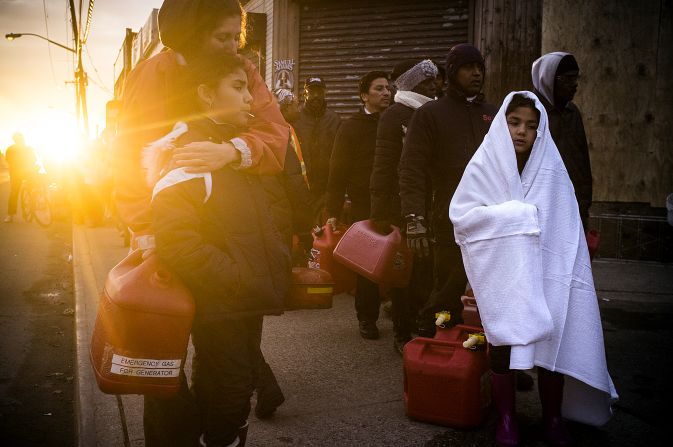 New Yorkers from Rockaway wait in line for gasoline on Tuesday, November 8 in the Rockaway area of Queens, New York.