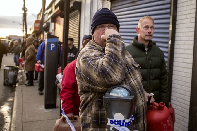 Rockaway residents wait in line for gas.