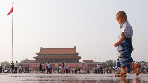 A young boy plays in Tiananmen Square in Beijing on June 3, 2012.