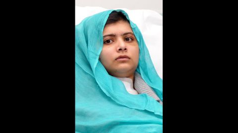 Malala sits up in bed on October 25, 2012 after surgery for a gunshot wound to the head.