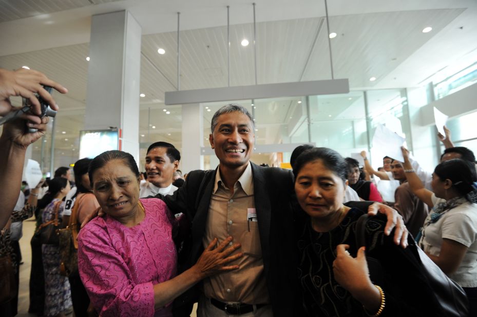 Myanmar academic Aung Naing Oo, who fled a brutal crackdown on student protests over two decades ago, is  greeted by relatives on February 10 upon his return to his homeland for the first time at Yangon international airport.  The country's reforms are luring back some of the its millions-strong diaspora to help rebuild their impoverished homeland, in a reversal of a decades-long brain drain.   