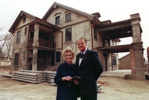 Graham and his wife visit her birthplace in Huaiyin, China, in 1988. They were married for 64 years until her death in 2007.