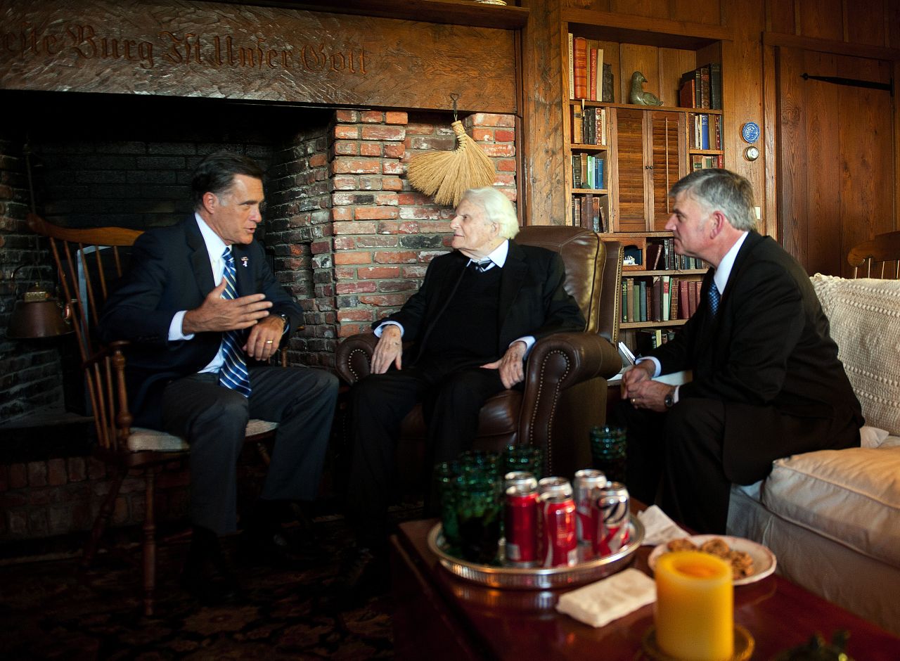 Republican presidential candidate Mitt Romney speaks with Graham and his son Franklin during a visit to Montreat in 2012.