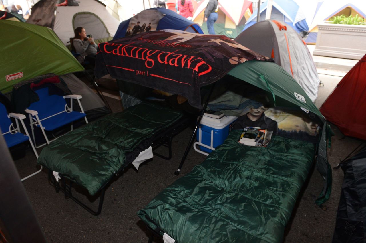 Dedicated fans of "The Twilight Saga" are camping out near Los Angeles' Nokia Theater ahead of Monday's "Breaking Dawn -- Part 2" premiere. Activities such as a Twilight-themed workout, as well as performances by Christina Perri, Paul McDonald and "Twilight" actress Nikki Reed, will reportedly take place at Summit Entertainment's "tent city," according to Deadline.