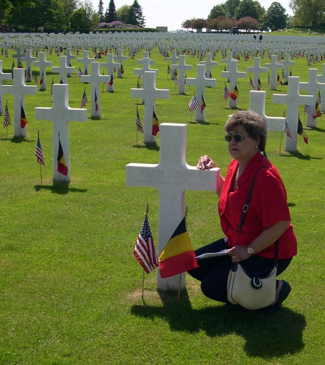 Carol Malone never met her father, but she visited his grave in Belgium's Henri-Chapelle American Cemetery in 2004.