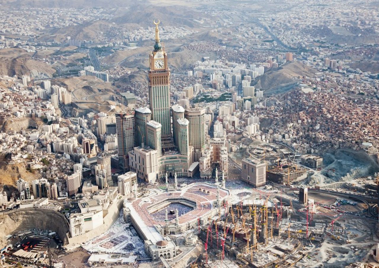 Mecca has changed dramatically over the past decades. This is how it appears in 2012. The Grand Mosque, in the foreground, is dwarfed by the Abraj Al Bait Towers complex, including the Royal Mecca Clock Tower.