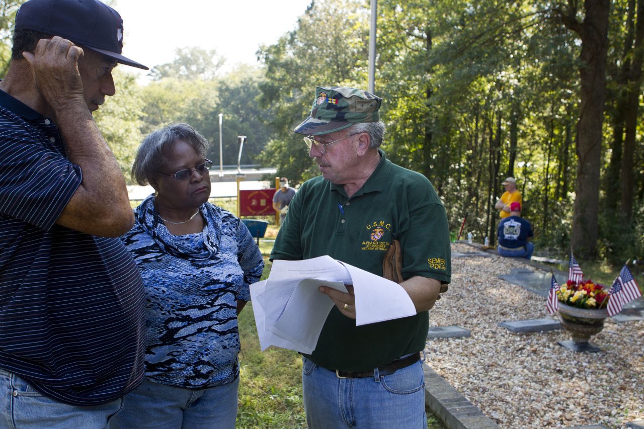 Volunteers from Macon's African-American community and Marine veterans organizations have been working to clear Linwood and build a lasting monument to Davis, Macon's only Medal of Honor recipient.  Here, Davis' older brother Gordon, Gordon's wife, Josephine, and Nicholas Warr, a Vietnam veteran, discuss the project.