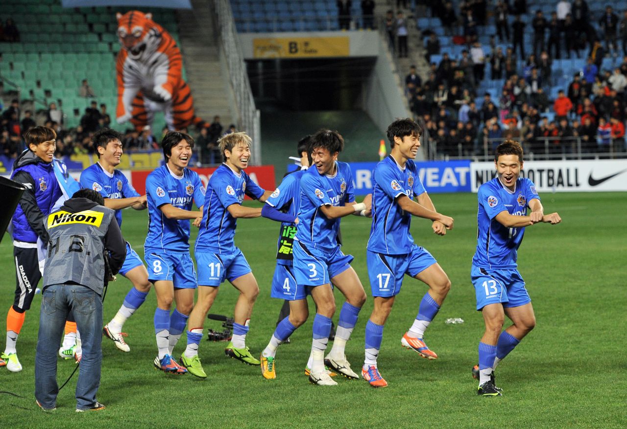 Ulsan Hyundai players perform the horse-riding dance of Psy's worldwide pop hit "Gangnam Style" after winning the AFC Champions League football final against Saudi Arabia's Al Ahli.