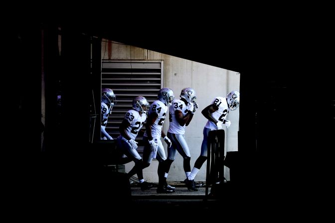 The Oakland Raiders take the field before playing the Baltimore Ravens at M&T Bank Stadium on Sunday in Baltimore, Maryland.
