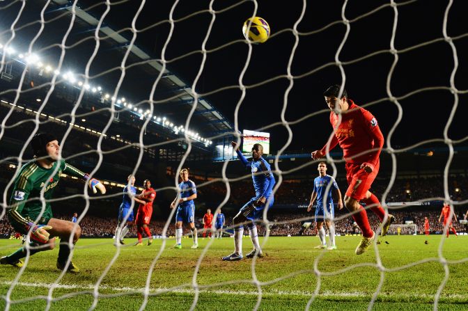Suarez joined Manchester United's Robin van Persie at the top of the EPL scoring charts with his eighth this season, earning Liverpool's sixth draw in 11 league outings.