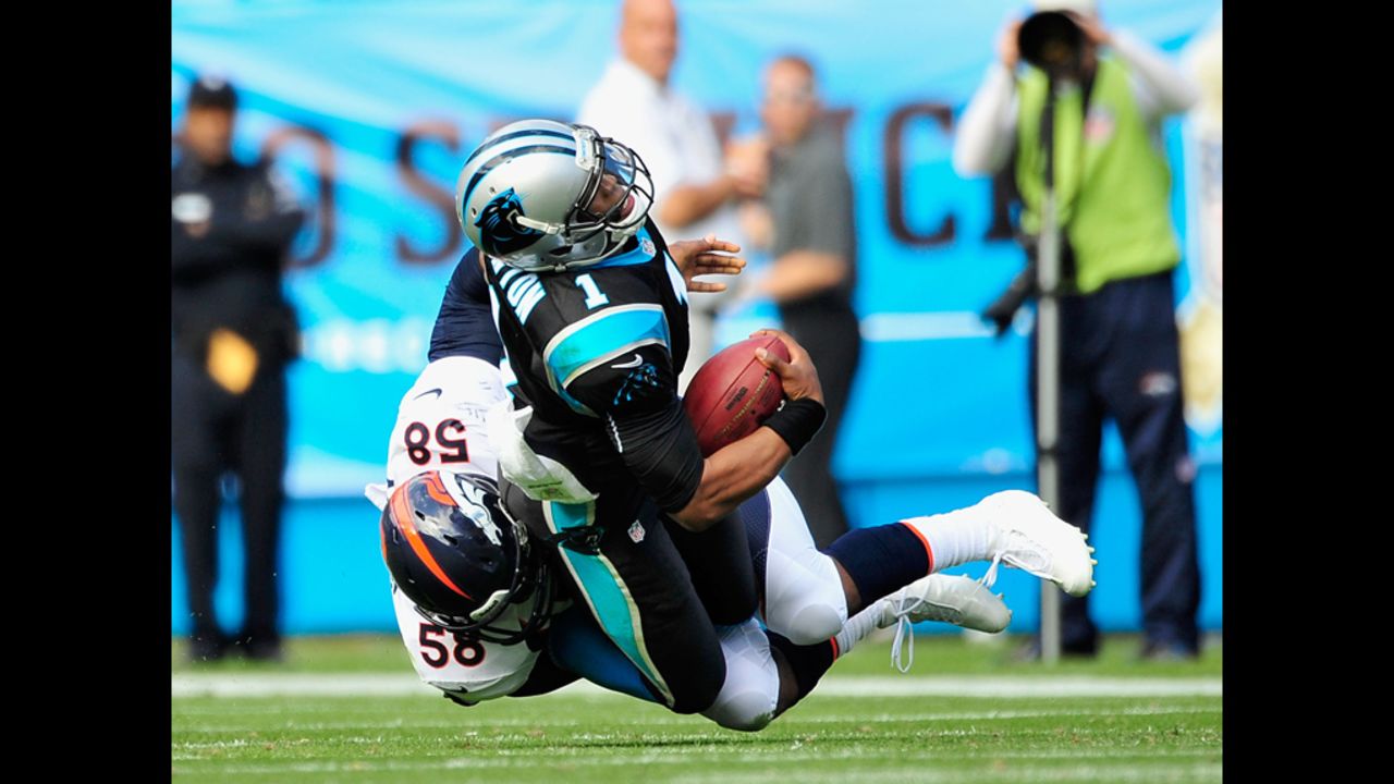 Von Miller of the Broncos sacks Cam Newton of the Panthers on Sunday.
