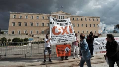Workers demonstrate against new austerity measures outside the parliament in Athens, Greece on November 10. 