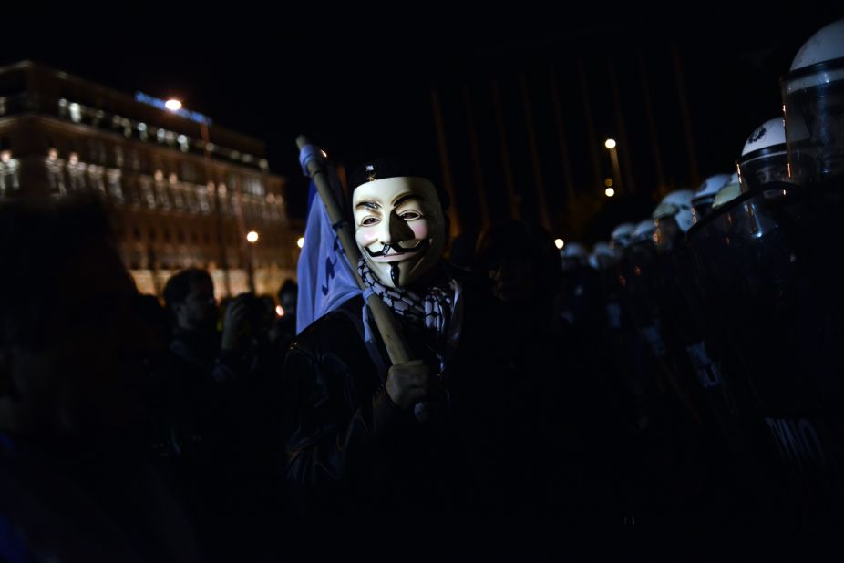 Protesters demonstrate outside the Greek parliament against the new austerity measures in Athens on November 11, 2012.