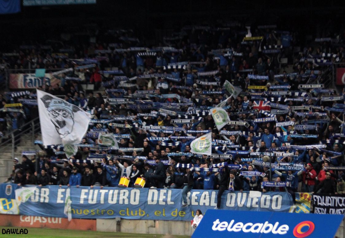Real Oviedo fans show their support for the club in the Estadio Carlos Tartiere with a banner reading "For the future of Real Oviedo". The third-tier club's financial problems are so great that they have turned to their fans for help, offering them the right to buy shares in Oviedo.