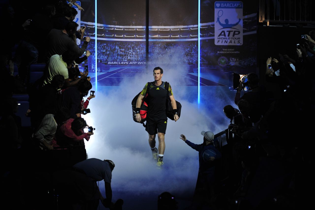 Local hero: Andy Murray walks out before an expectant crowd at the O2 Arena in London.