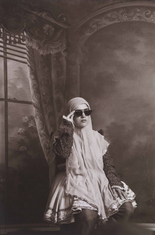 <strong>From the series 'Qajar' by Shadi Ghadirian (1998) <br /></strong>In "Qajar," Tehran-based art photographer Shadi Ghadirian recreates 19th century Iranian studio portraits. By adding incongruous modern day accessories, she hopes to shed light on the fight between tradition and modernity faced by Iran's women.