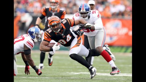 Jermaine Gresham of the Bengals runs with the ball during the game against the Giants on Sunday.