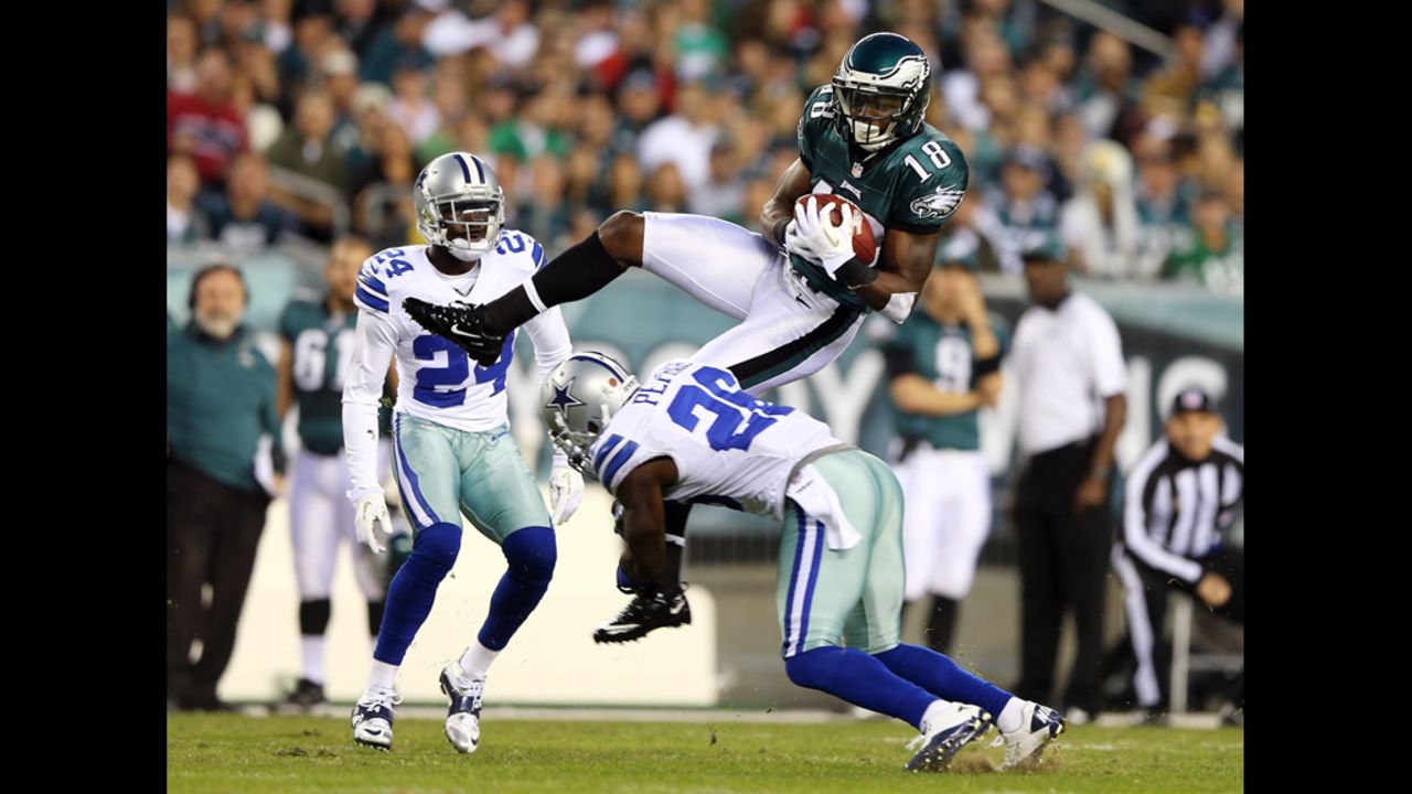 Jeremy Maclin of the Philadelphia Eagles goes up for the catch but does not hang on to the ball as he is hit by Charlie Peprah of the Dallas Cowboys on Sunday at Lincoln Financial Field in Philadelphia.