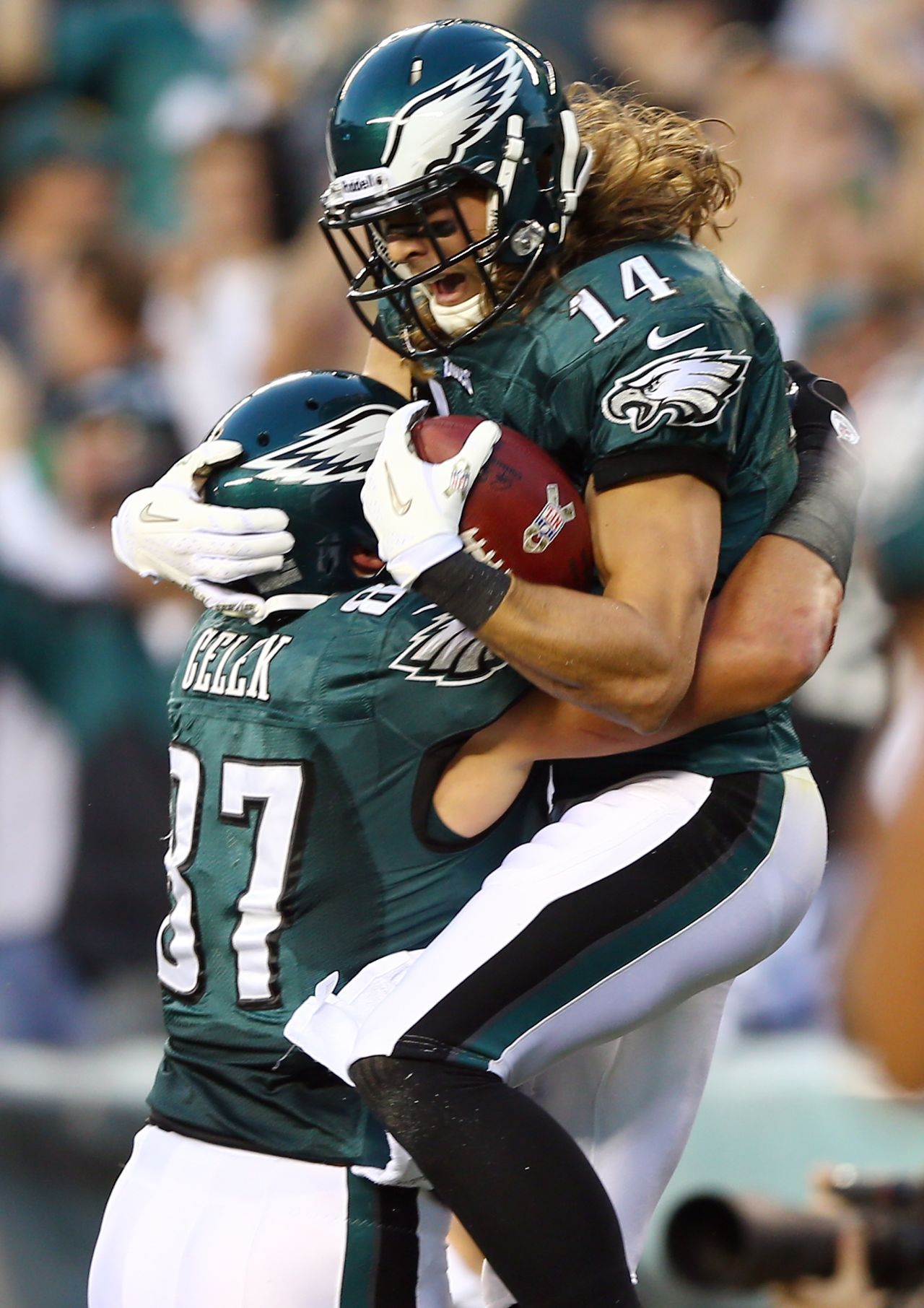 Riley Cooper of the Eagles celebrates his touchdown with teammate Brent Celek in the first quarter against the Cowboys on Sunday.