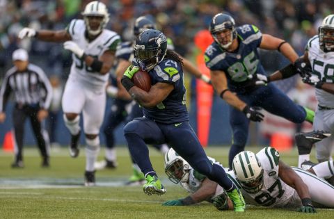 Running back Marshawn Lynch of the Seahawks rushes against the Jets on Sunday.