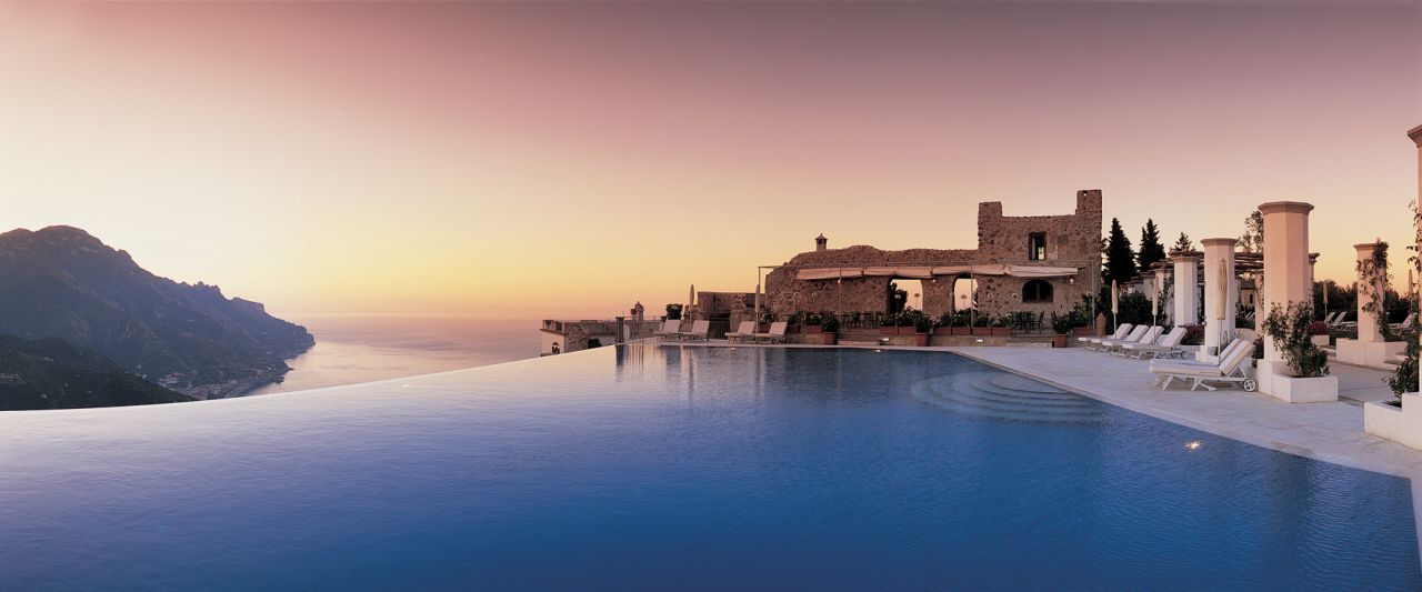 The Hotel Caruso Belvedere's pool blends seamlessly with the surrounding sea.