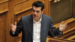 Left coalition main opposition party leader, Alexis Tsipras, gestures during his speech at the Greek parliament on July 7, 2012.