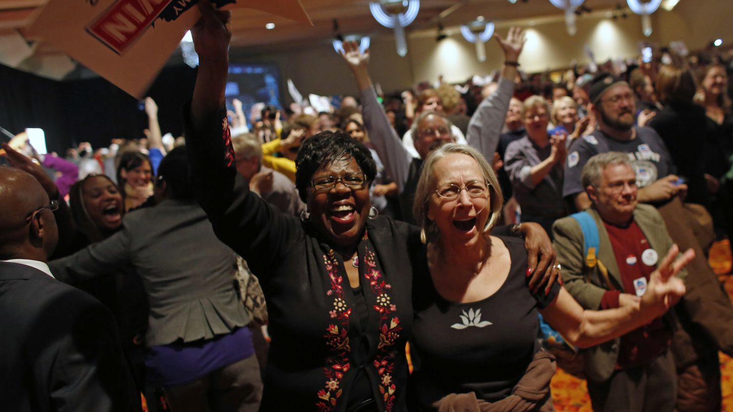 Supporters cheer after President Obama's projected win is announced during an election night event in Wisconsin.