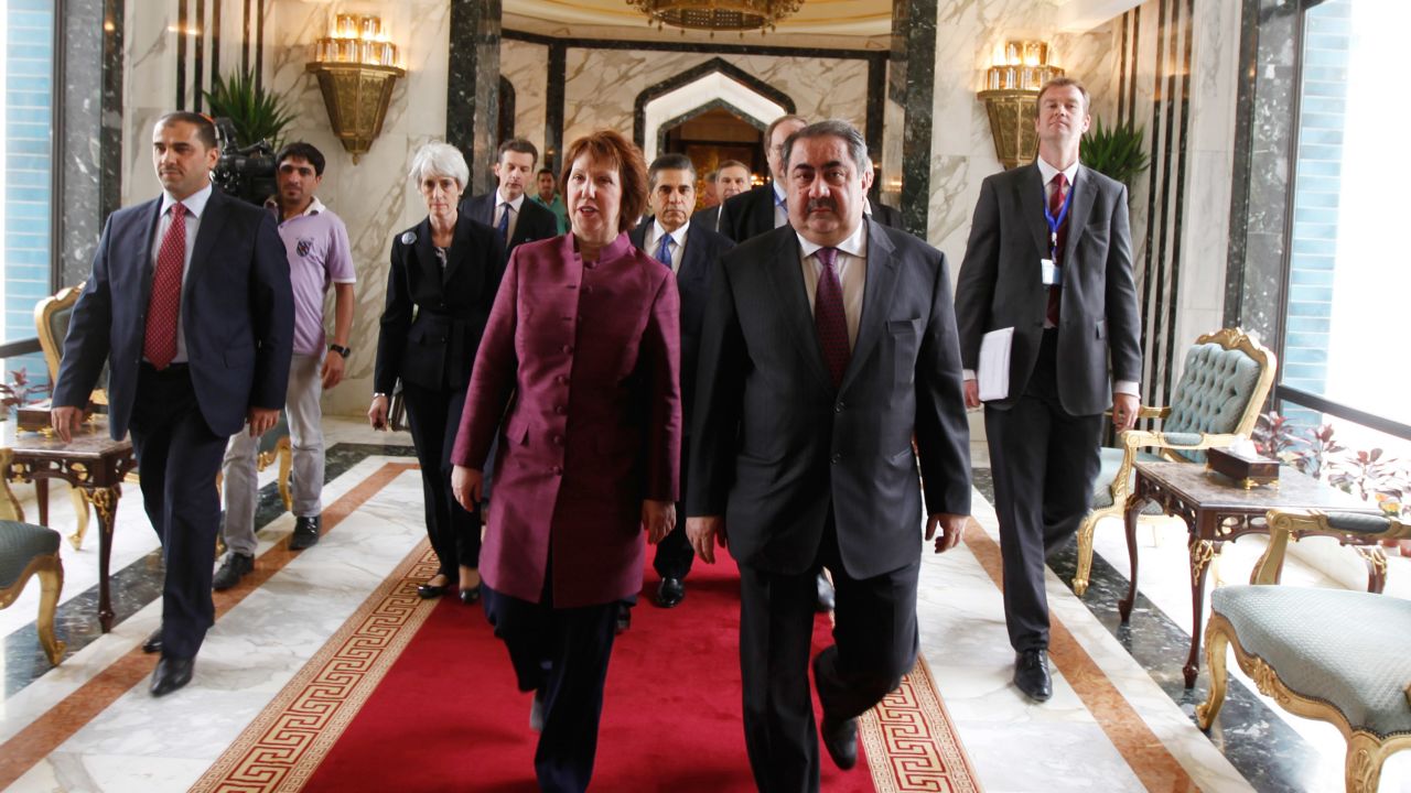 British EU official Catherine Ashton, front left, walks with Iraq's Hoshyar Zebari to talks between the P5+1 and Iran.