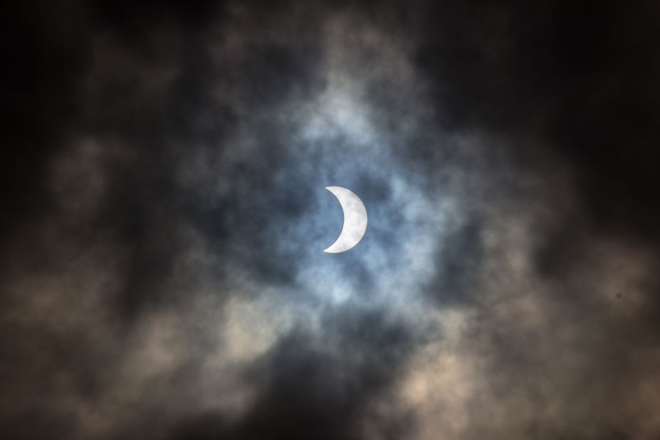 "You see the images on the news and in the papers but I think that by the time something has gone to print the impact is lost to a degree, it's different being 'present' for the eclipse. It's [awe-inspiring]," said <a href="http://ireport.cnn.com/people/elysis">Samantha J Hughes</a> from Auckland, New Zealand. 