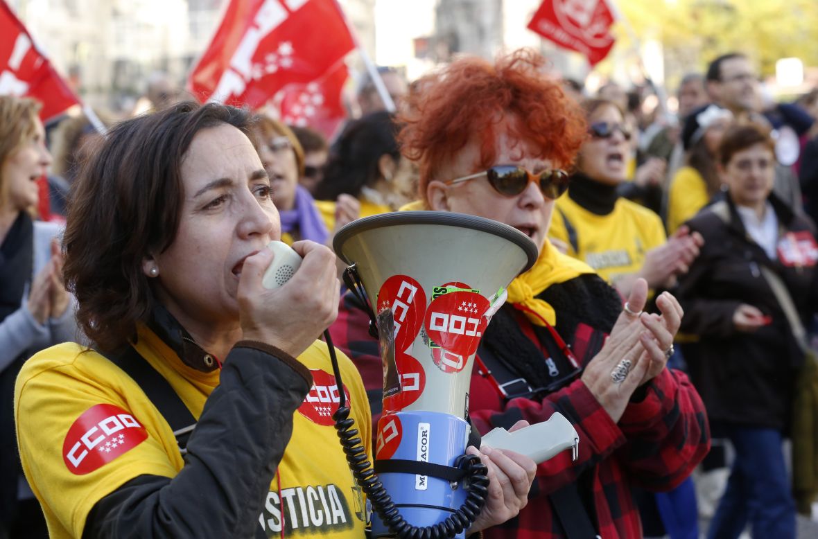 Protesters shout during a demonstration at Cibeles Square in Madrid.