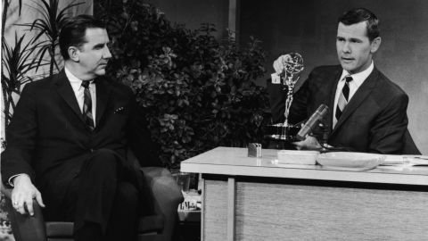 In 1963, Johnny Carson sits with an Emmy award on his desk beside announcer Ed McMahon.