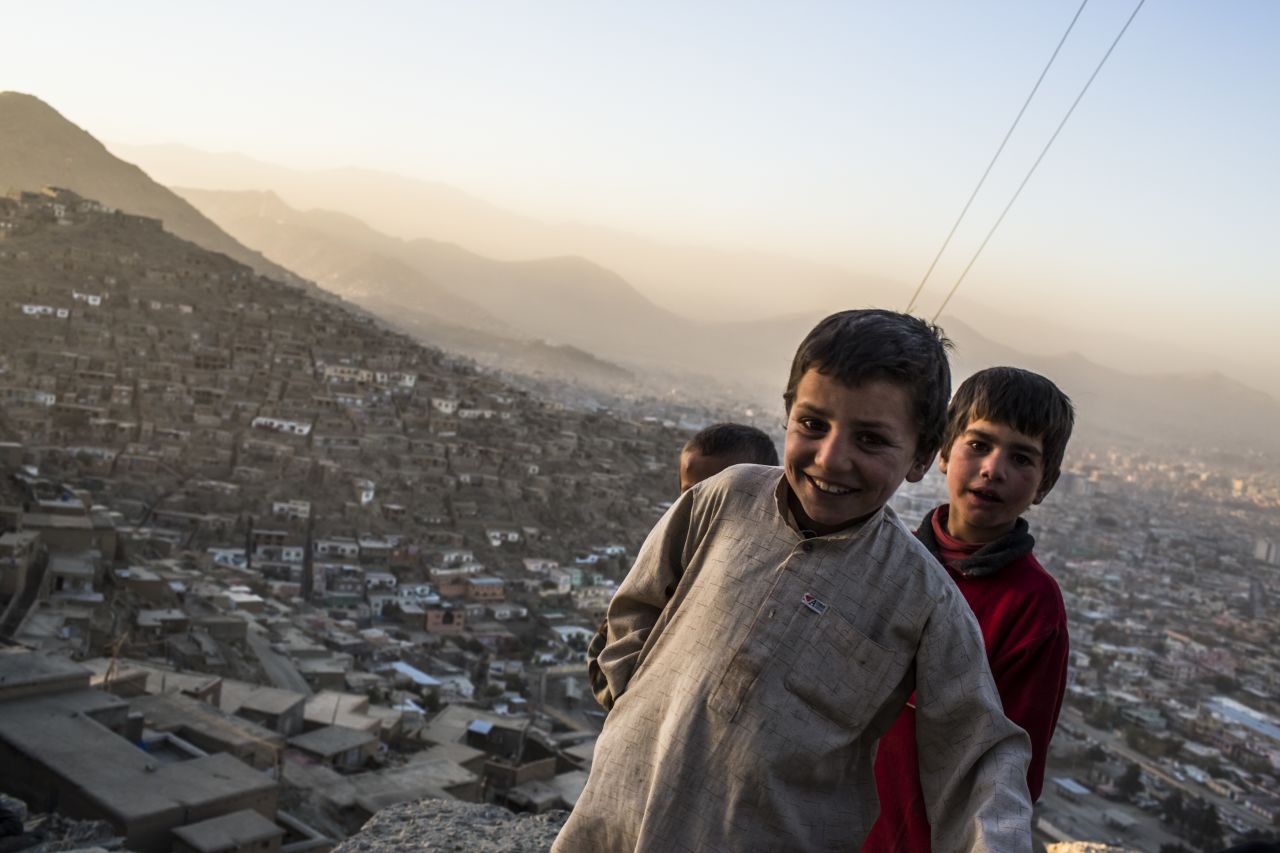 Afghan children play in the outskirts of Kabul on November 11, 2012.