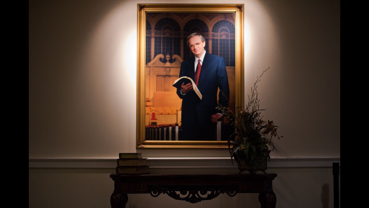 A portrait of Charles Stanley greets visitors to First Baptist Church Atlanta. Stanley's divorce led to calls for his resignation, but Stanley refused to step down, saying he answered to a higher authority.
