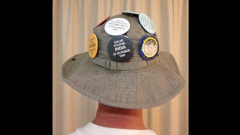 This was the thirteenth time "professional eclipse chaser" <a href="http://ireport.cnn.com/people/Borealguy">Mike Smith</a> has witnessed a total eclipse. The badges on his hat commemorate each of his previous experiences. "We viewed this one from Green Island, which is 25 kilometers off the coast of Cairns as we were warned it was going to be cloudy on land," he says. "The eclipse was as unique and beautiful as ever."