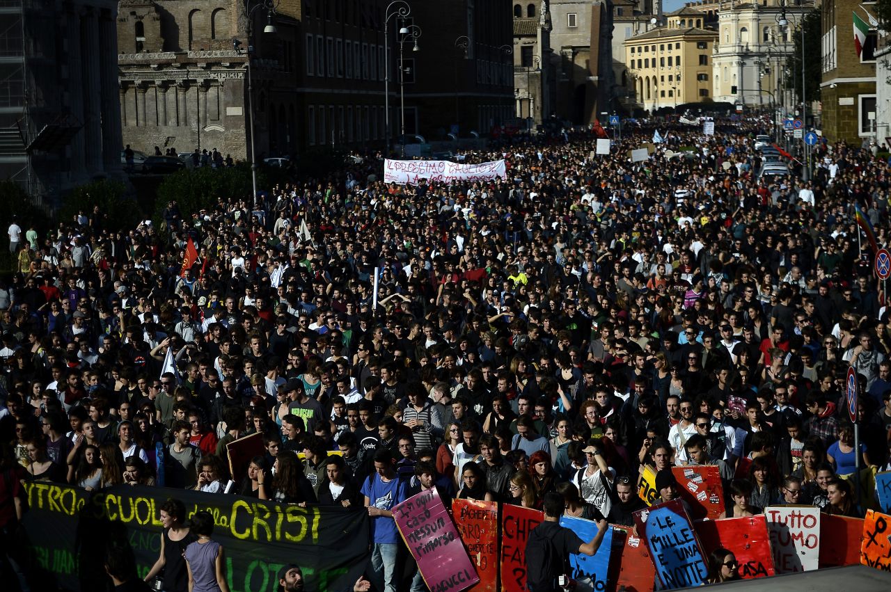 Demonstrators in Rome march Wednesday against austerity measures. Protesters say government spending cuts will compromise livelihoods and increase unemployment.