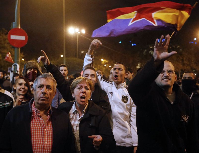 Demonstrators turn out near the Spanish parliament in Madrid during a general strike Wednesday. Spain's public transport has been shut down, or disrupted, while many schools, shops, factories and airports are closed.