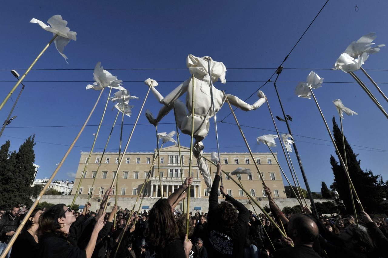A puppet center stages a performance outside the Greek parliament in Athens during an anti-austerity protest Wednesday.