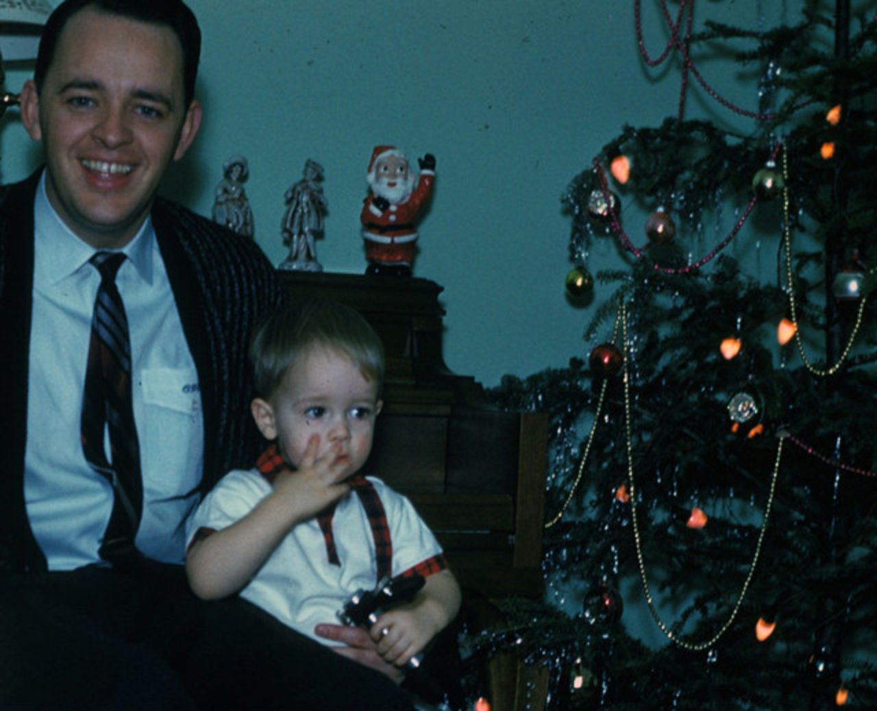 Andy, then about 4, with his father, the Rev. Charles Stanley, during Christmas. - (Courtesy of Charles Stanley)