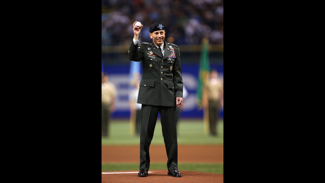 Petraeus acknowledges the fans before throwing out the ceremonial first pitch of the second game of the 2008 MLB World Series between the Philadelphia Phillies and the Tampa Bay Rays in October 2008 in Tampa.
