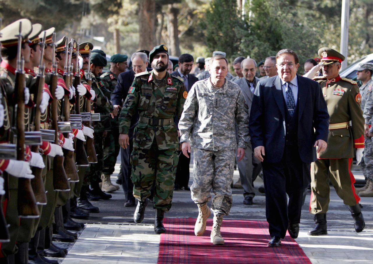 At the end of October, Petraeus was advanced to Commander of Central Command. Pictured, Petraeus and Afghan Defense Minister Gen. Abdul Rahim Wardak inspect an Afghan Guard of Honor at the Defense Ministry in Kabul on November 5, 2008. Petraeus arrived in Kabul to assess efforts against insurgents in the start of his new job, the U.S. military said.