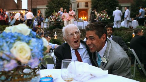 On August 21, 2010, TV reporter Roby Chavez, right, shares a moment with gay rights activist Frank Kameny during Chavez and Chris Roe's wedding ceremony in the nation's capital. Same-sex marriage became legal in Washington in March 2010.