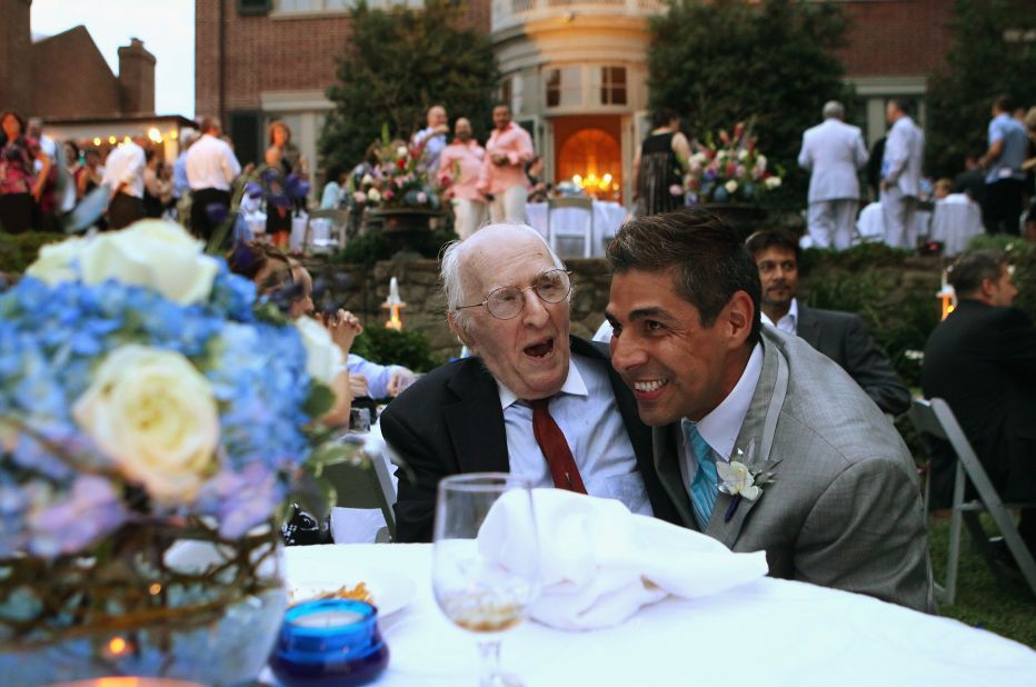 On August 21, 2010, TV reporter Roby Chavez, right, shares a moment with gay rights activist Frank Kameny during Chavez and Chris Roe's wedding ceremony in the nation's capital. Same-sex marriage became legal in Washington in March 2010.