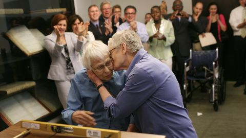 Phyllis Siegel, right, kisses her wife, Connie Kopelov, after exchanging vows at the Manhattan City Clerk's office on July 24, 2011, the first day New York's Marriage Equality Act went into effect.