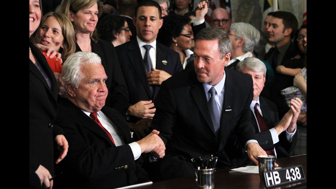 On March 1, 2012, Maryland Gov. Martin O'Malley, center, shakes hands with Senate President Thomas V. "Mike" Miller after signing a same-sex marriage bill. The law was challenged, but voters approved marriage equality in a November 2012 referendum.